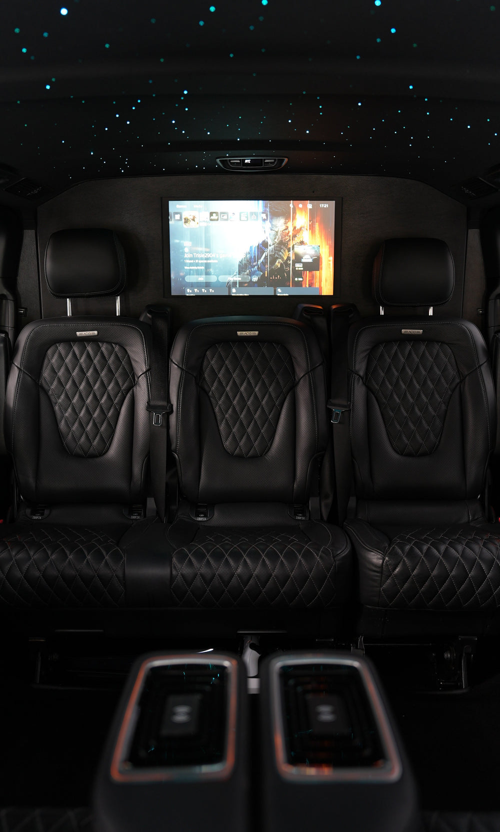 Luxury cabin — entertainment screen and quilted seating